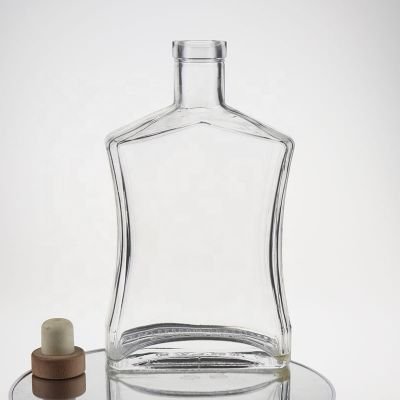 Unique shape 660ml glass liquor bottle for vodka whiskey rum with heavy base 