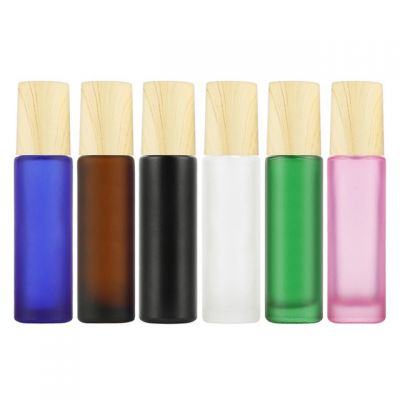 Small quantity 10ml blue/amber/black/clear/pink bamboo cap essential oil roller glass bottle