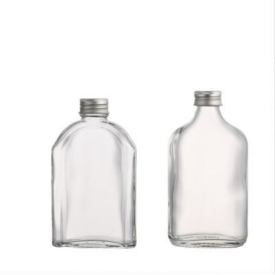 Manufacturer customized beverage glass bottle juice coffee glass bottle with screw lids 