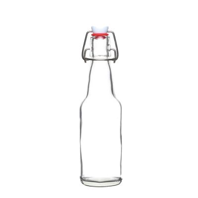 Wholesale Eco-friendly high quality round clear 330ml empty glass beer bottles swing top