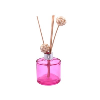 Pink color coated diffuser bottle reed aroma glass bottle with cap 