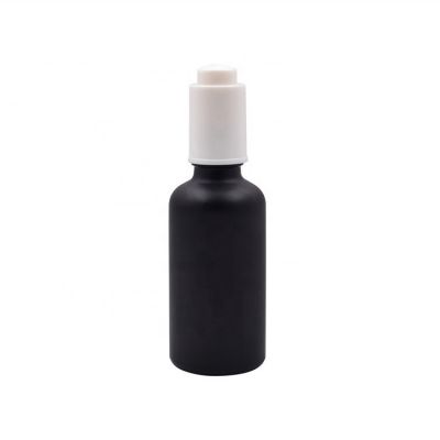 luxury matte black essential oil bottle with pressed dropper 