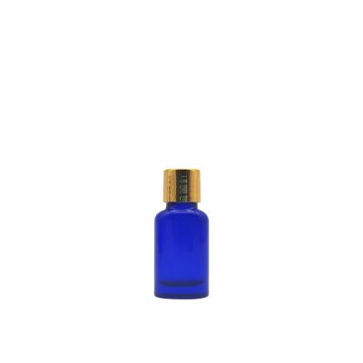 Wholesale Luxury 10ml Empty Blue Perfume Essential Oil Arc Flat Packaging Glass Bottle With Golden Lid