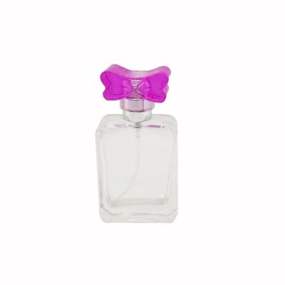 Portable perfume bottle 25ml glass bottle spray pump Bow spray cover