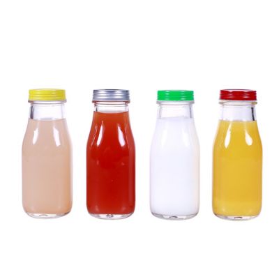 Wholesale 300ml Transparent Milk Juice Bottle with Metal Cover 