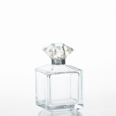 Luxury clear 100ml glass perfume bottle with plastic cap 