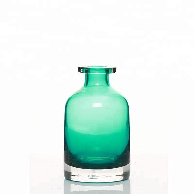 Round Shaped 150ml Blue Colored Glass Diffuser Bottle With Flower 