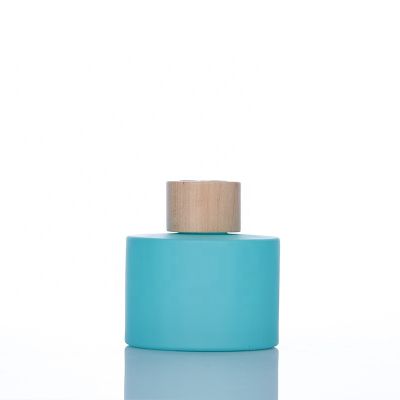 Decorative 200ml 7oz Round Matte Blue Empty Glass Aroma Diffuser Bottle with Rattan Flower 