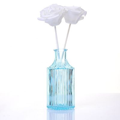 Wholesale 150ml decorative round shape clear blue vertical stripe glass aroma reed diffuser bottles 