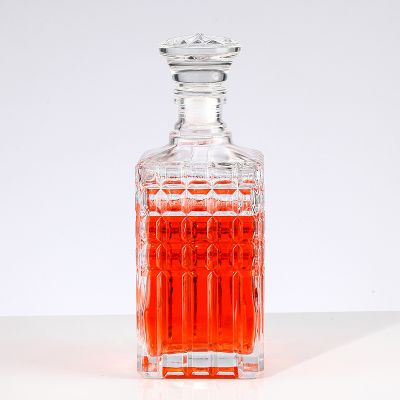 High-quality custom-made transparent 500ml whisky brandy glass bottle with unique shape and hand-carved surface 