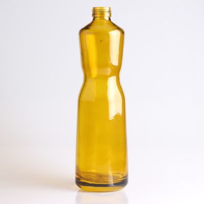 Amber and coloured glass drinking bottle 