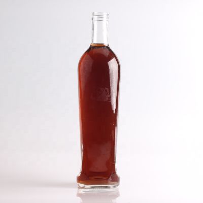 Botella de licor de forma personalizada con logo Nuevo diseno de peso de botella de vidrio para whisky 