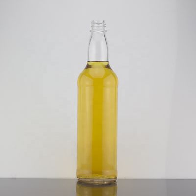 Custom Round Shape Screw Cap Sealed Transparent 700ml Whisky Glass Bottle