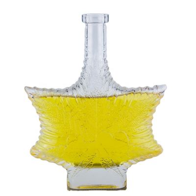 Leaf Shape Emboss Design Customized High Flint Liquor Spirits Glass Bottle For Vodka Whiskey 750ml With Cork Stopper