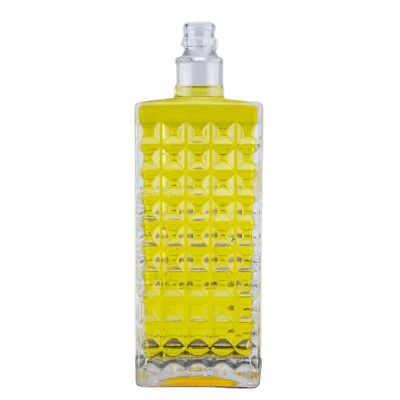 Customized High Flint Embossed Design And Logo Whiskey Vodka Glass Bottle For LIquor Spirits With Screw Cap 750ml 