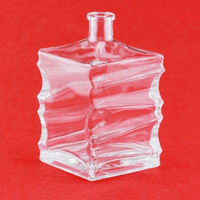 Fashion Design Elegant Emboss Clear Square Shape 750ml spirit Glass Bottle With Cork Stopper 