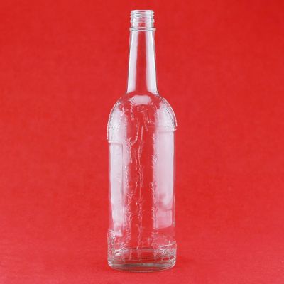 Factory Sell Good Quality Custom Embossed High Flint 750ml Liquor Glass Bottle With Screw Caps 