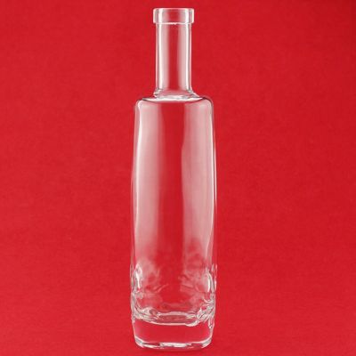 Top ODM/OEM Unique Bottom Design Glass Bottle Round Shape Vodka Bottle Glass Bottle For Spirit Cork 