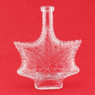 Maple Leaf Shape Glass Liquor Bottle Unique Shaped Vodka Embossed Whiskey Bottle With Cork 