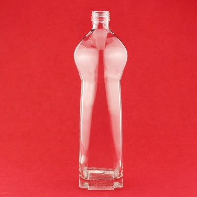 Custom Design 700ml 750ml Unique Shape Glass Bottle Round And Square Bottom Brandy Bottle With Screw Cap 