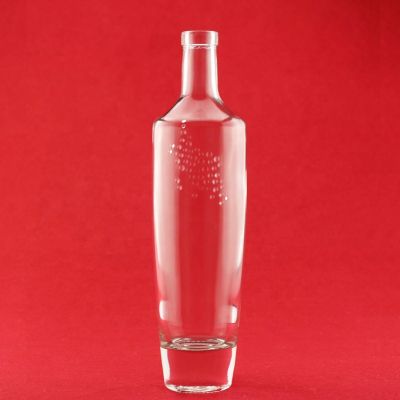Lasted Design Thickness Bottom Glass Bottle Embossed Custom Logo Round Shape Brandy Glass Bottle With Cork 