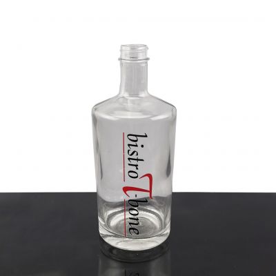 Competitive Price Delicate Design Round Embossed Brandy Whisky Super White Glass Bottle 