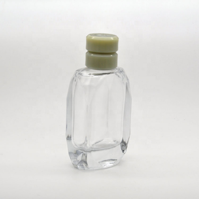Fancy design 100 ml polyhedron glass empty perfume bottles 