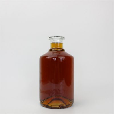 Hot product raised bottom exquisite liquor glass bottle 700ml liquor glass bottle with wooden cork