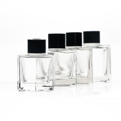 Stocked cheap 50ml square shaped clear glass reed diffuser bottles with screw caps