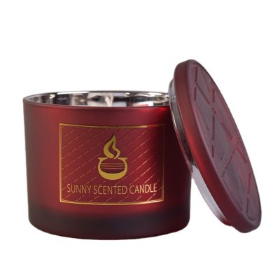 Red colored glass jar cylinder with gold printing