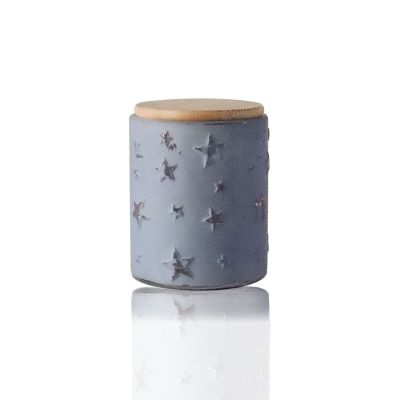 China Supply Spray Process Glass Candle Holder For Decoration With Stars Relief In Bulk Glass Candle Jar With Bamboo Lid