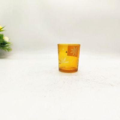 Yellow cup body with four-leaf clover logo popular trendy glass candle holder