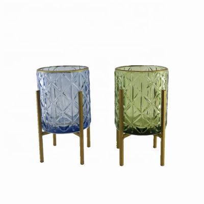 The embossed and colorful votive glass candle holder with gold line on the mouth gold metal candlestick for home decoration