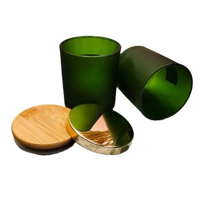 Wholesale green glass candle jar with wood/metal lid for home decoration