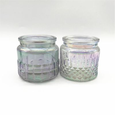 Iridescent candle jars are used for decoration Small candle jars