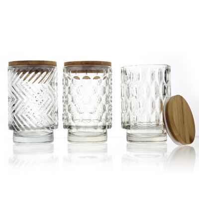 Wholesale Embossed Surface Clear Glass Empty Candle Jars Candle Holder With Wooden Lid