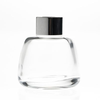OEM Clear Empty Round Fragrance Bottle 100ml Reed Diffuser Bottles Glass with lids