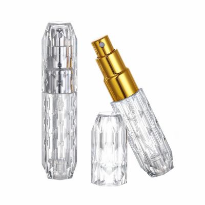 Hot Sale 5Ml Round Shape Embossed Glass Perfume Bottle With Silver Golden Spray Pump