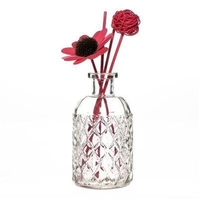 Good Quality Embossed Reed Diffuser Bottles 250ml Luxury Glass Bottle With Artificial Flower