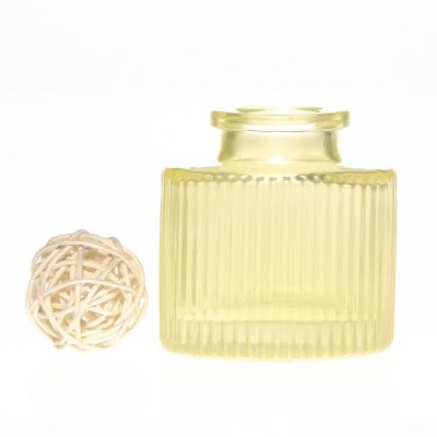 Hot Sale OEM Luxury Yellow 30ml Emboosed Round Reed Diffuser Glass Bottle