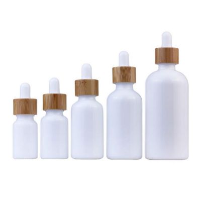Eco Friendly Custom Bamboo Dropper Opal White Glass Cbd Oil Bottle For Essential Oil Perfume