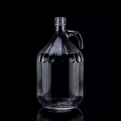 Best-Selling Chinese Supplier 700ml 750ml Whiskey Vodka Empty Glass Bottle With Handle Super Flint Glass Whiskey Glass Bottle
