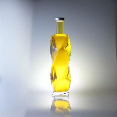 Wholesale Unique Shape Super Flint Glass Carving Rotating 700ml750ml Brandy Bottle Factory Price