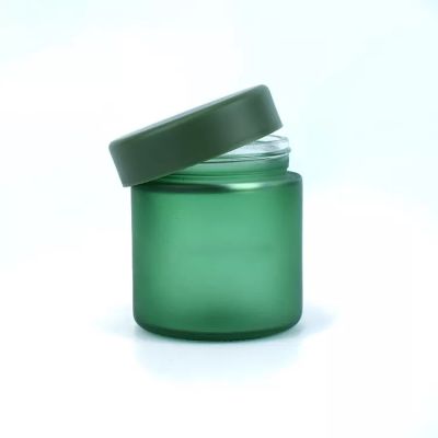 2021 hot selling reasonable price child proof frosted green bottle glass jars with lids for flower packaging