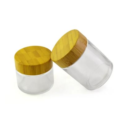 2oz 4oz 60ml Smell Proof Wide Mouth Frosted Engraving Logo Round Bamboo Wooden Glass Jar Container with Bamboo Lid Wooden Lid