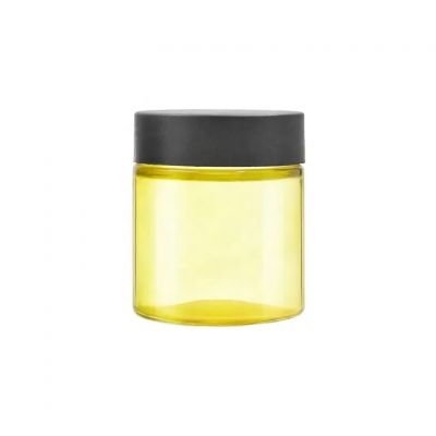 Manufacturer 100ml yellow clear cosmetic cream wide mouth empty packaging flower glass jar with black plastic childproof lid