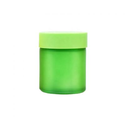 Hot sale fancy 85ml frosted green cosmetic cream wide mouth empty packaging flower glass jar with green childproof lid