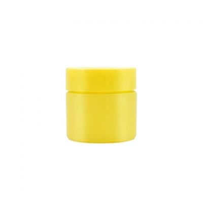 Hot sale fancy 70ml matte yellow cosmetic cream wide mouth empty packaging flower glass jar with yellow childproof lid
