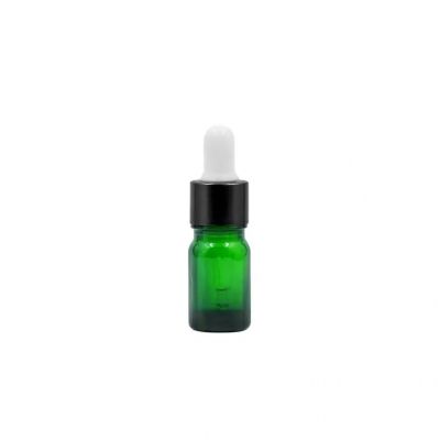 Wholesale green High quality mini 5ml Essential oil glass bottles with sprayer pump head