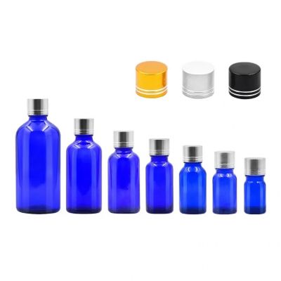 Wholesale varies specifications round blue Essential oil glass bottles with aluminum screw cap